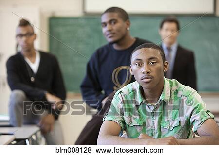 High school students and teacher in classroom View Large Photo Image Stock Photo - High school students and teacher in classroom. Fotosearch