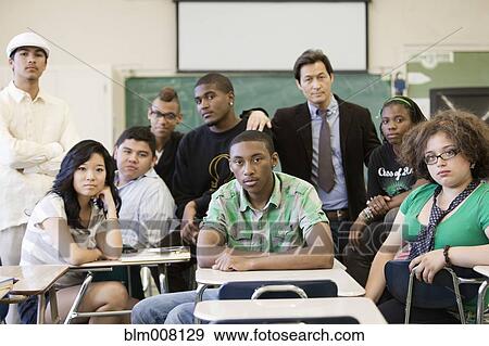 High school students and teacher in classroom View Large Photo Image Stock Photo - High school students and teacher in classroom. Fotosearch