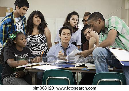 High school students listening to teacher View Large Photo Image Stock Image - High school students listening to teacher. Fotosearch