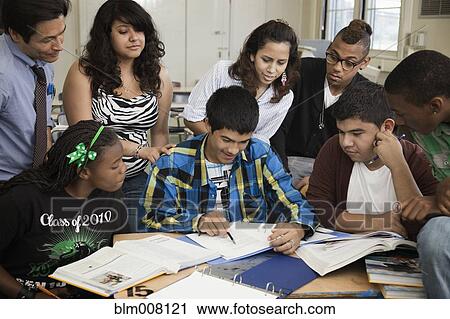 High school students working together in classroom View Large Photo Image Stock Image - High school students working together in classroom. Fotosearch