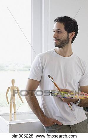 artist holding palette