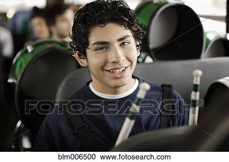 Hispanic band student riding school bus View Large Photo Image Stock Image - Hispanic band student riding school bus. Fotosearch