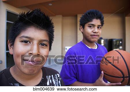 Hispanic boys with basketball View Large Photo Image Stock Photo - Hispanic boys with basketball. Fotosearch