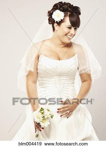 Hispanic bride laughing View Large Photo Image Stock Photo - Hispanic bride laughing. Fotosearch