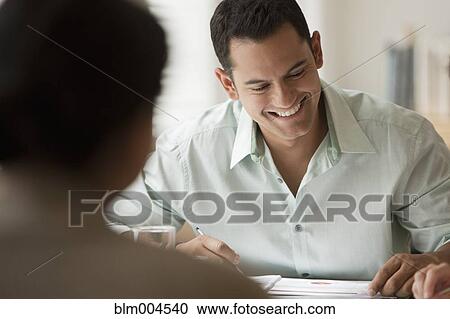 Hispanic business people working together View Large Photo Image Stock Image - Hispanic business people working together. Fotosearch