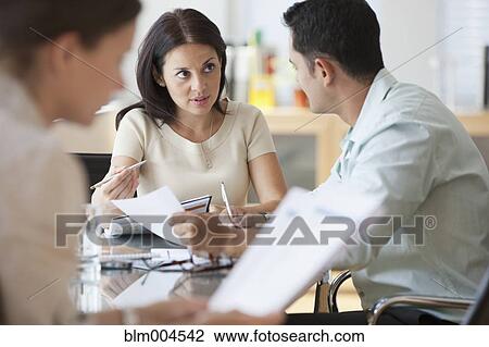 Hispanic business people working together View Large Photo Image Stock Image - Hispanic business people working together. Fotosearch