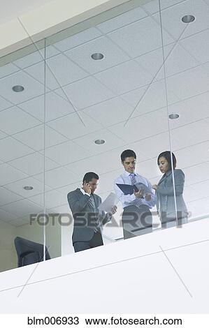 Hispanic business people working together View Large Photo Image Stock Image - Hispanic business people working together. Fotosearch