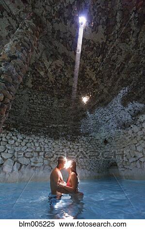 Hispanic couple kissing in swimming pool View Large Photo Image Stock Photography - Hispanic couple kissing in swimming pool. Fotosearch