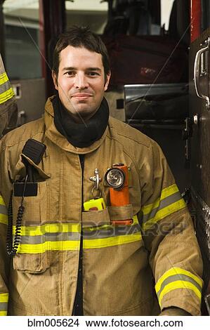 Hispanic fireman in coat View Large Photo Image Picture - Hispanic fireman in coat. Fotosearch