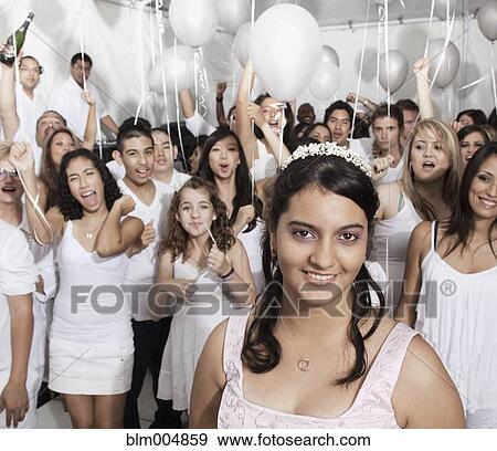 Stock Photo - Hispanic girl enjoying quinceanera party. Fotosearch