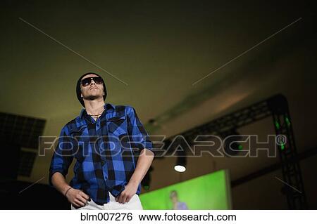 Hispanic man modeling clothing View Large Photo Image Stock Photograph - Hispanic man modeling clothing. Fotosearch