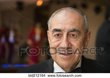 Hispanic man smiling at wedding reception View Large Photo Image Picture - Hispanic man smiling at wedding reception. Fotosearch