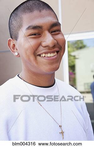 Hispanic man smiling View Large Photo Image Stock Photograph - Hispanic man smiling. Fotosearch