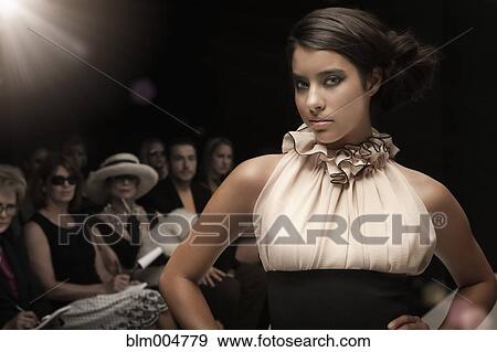 Hispanic model on runway in fashion show View Large Photo Image Stock Photo - Hispanic model on runway in fashion show. Fotosearch