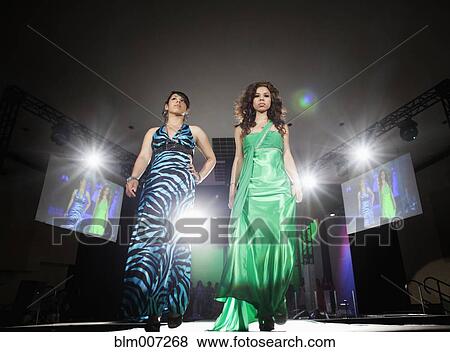 Stock Photo - Hispanic models on fashion runway. Fotosearch