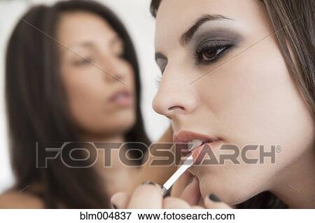 Stock Photo - Hispanic models preparing for fashion show. Fotosearch