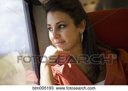 Hispanic riding on train View Large Photo Image Stock Image - Hispanic riding on train. Fotosearch