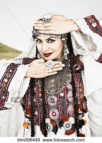 Stock Photo - Hispanic woman in ornate headdress. Fotosearch