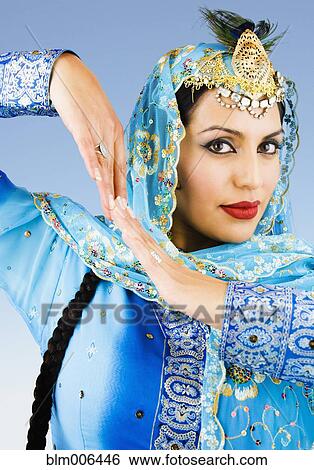 Stock Photograph - Hispanic woman in ornate headdress. Fotosearch