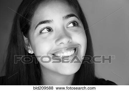 Stock Photo - Hispanic woman smiling. Fotosearch