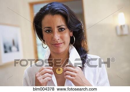 Stock Photo - Hispanic woman smiling. Fotosearch
