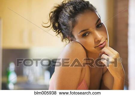 Hispanic woman thinking View Large Photo Image Stock Photo - Hispanic woman thinking. Fotosearch
