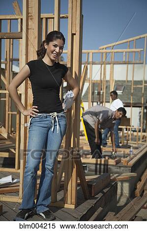 Hispanic woman working at construction site View Large Photo Image Stock Photography - Hispanic woman working at construction site. Fotosearch