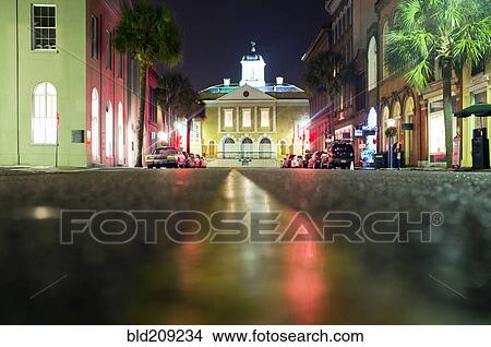 Picture - Illuminated buildings along city street at night, Charleston, South Carolina, United States. Fotosearch