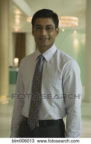 Indian businessman smiling View Large Photo Image Stock Image - Indian businessman smiling. Fotosearch