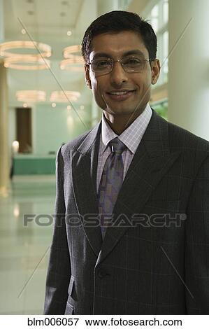 Stock Photo - Indian businessman smiling. Fotosearch
