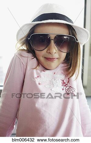 Italian girl in fedora and sunglasses View Large Photo Image Stock Image - Italian girl in fedora and sunglasses. Fotosearch