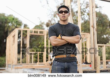 Japanese construction worker in sunglasses with arms crossed View Large Photo Image Stock Photo - Japanese construction worker in sunglasses with arms crossed. Fotosearch