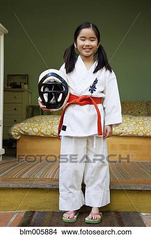 Picture - Japanese girl in karate uniform. Fotosearch