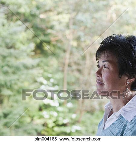 Japanese woman looking pensive View Large Photo Image Stock Photography - Japanese woman looking pensive. Fotosearch