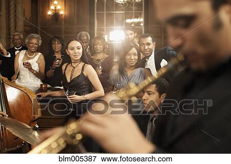 Jazz musicians performing in nightclub View Large Photo Image Stock Photo - Jazz musicians performing in nightclub. Fotosearch