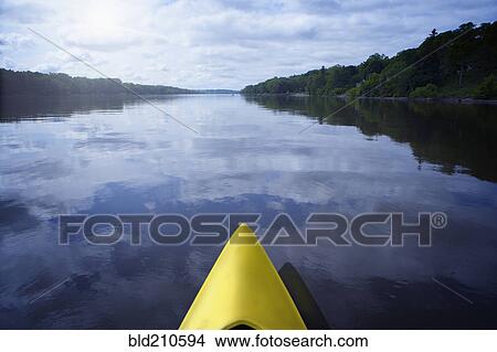 Picture - Kayak on still calm lake, Albany, New York, United States. Fotosearch