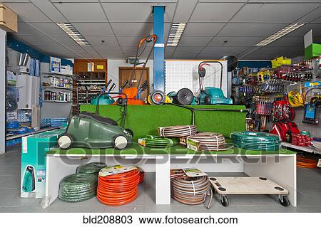 Lawn mowers, trimmers, and hoses View Large Photo Image Stock Image - Lawn mowers, trimmers, and hoses. Fotosearch