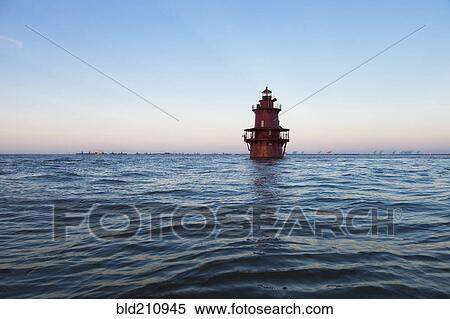 Stock Photography - Lighthouse in ocean. Fotosearch