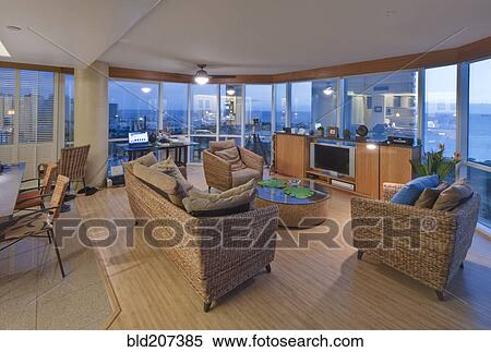 Stock Photography - Living room in luxury highrise apartment. Fotosearch