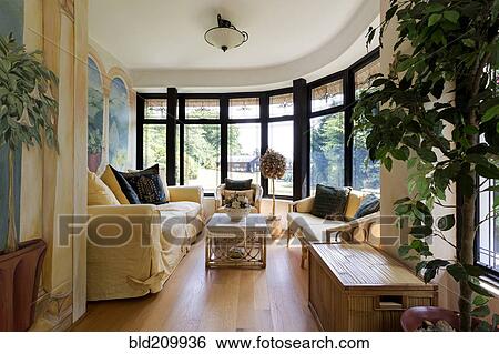 Stock Photograph - Luxury living room with bay windows. Fotosearch