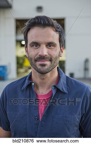 Man smiling outdoors View Large Photo Image Stock Photograph - Man smiling outdoors. Fotosearch