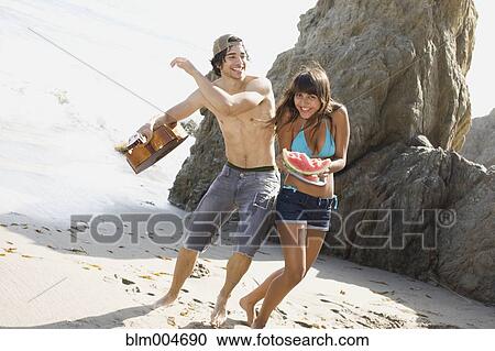 Man with guitar teasing girlfriend View Large Photo Image Stock Image - Man with guitar teasing girlfriend. Fotosearch