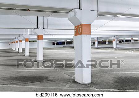 Markings of empty parking structure View Large Photo Image Stock Photograph - Markings of empty parking structure. Fotosearch