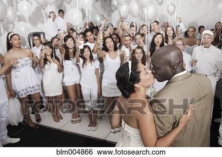 Married couple enjoying wedding reception View Large Photo Image Stock Photograph - Married couple enjoying wedding reception. Fotosearch