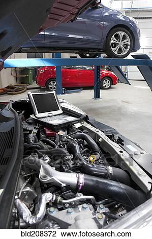 Stock Image - Mechanical and practical education facility car workshop. Fotosearch