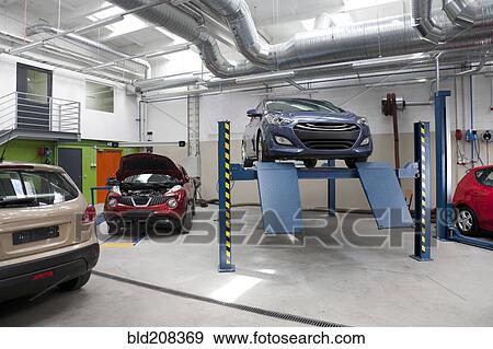 Stock Photo - Mechanical and practical education facility car workshop. Fotosearch