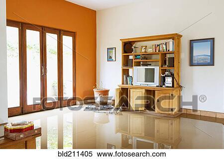 Stock Photography - Media center and windows of flooded house. Fotosearch