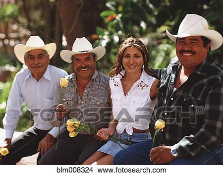 Men and woman sitting and holding roses View Large Photo Image Picture - Men and woman sitting and holding roses. Fotosearch