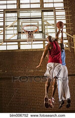 Men playing basketball View Large Photo Image Stock Image - Men playing basketball. Fotosearch