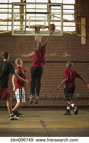 Men playing basketball View Large Photo Image Stock Photo - Men playing basketball. Fotosearch